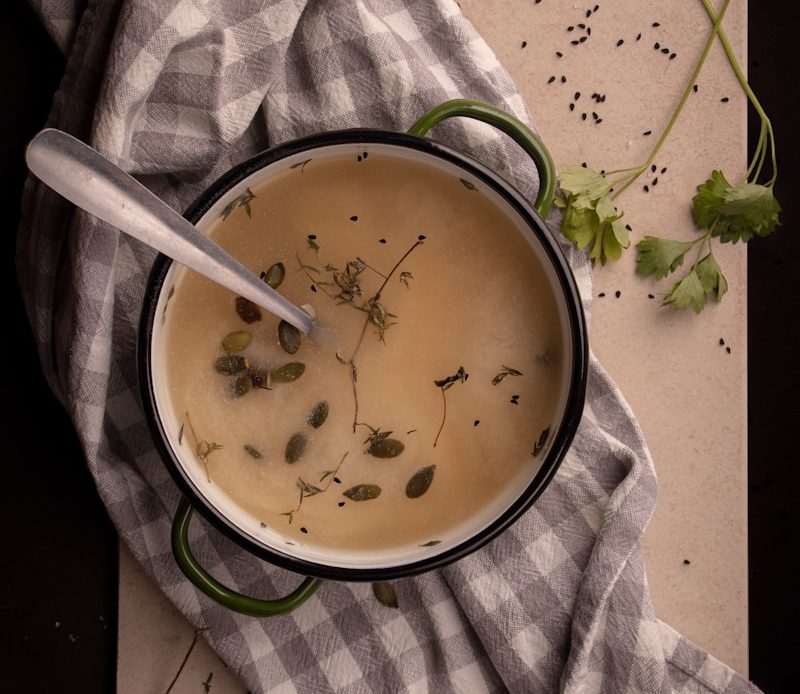 a bowl with a spoon in it