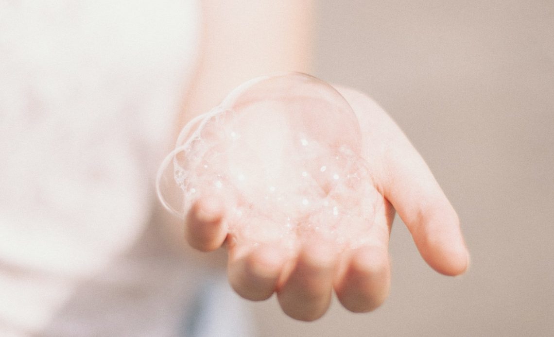person holding bubbles